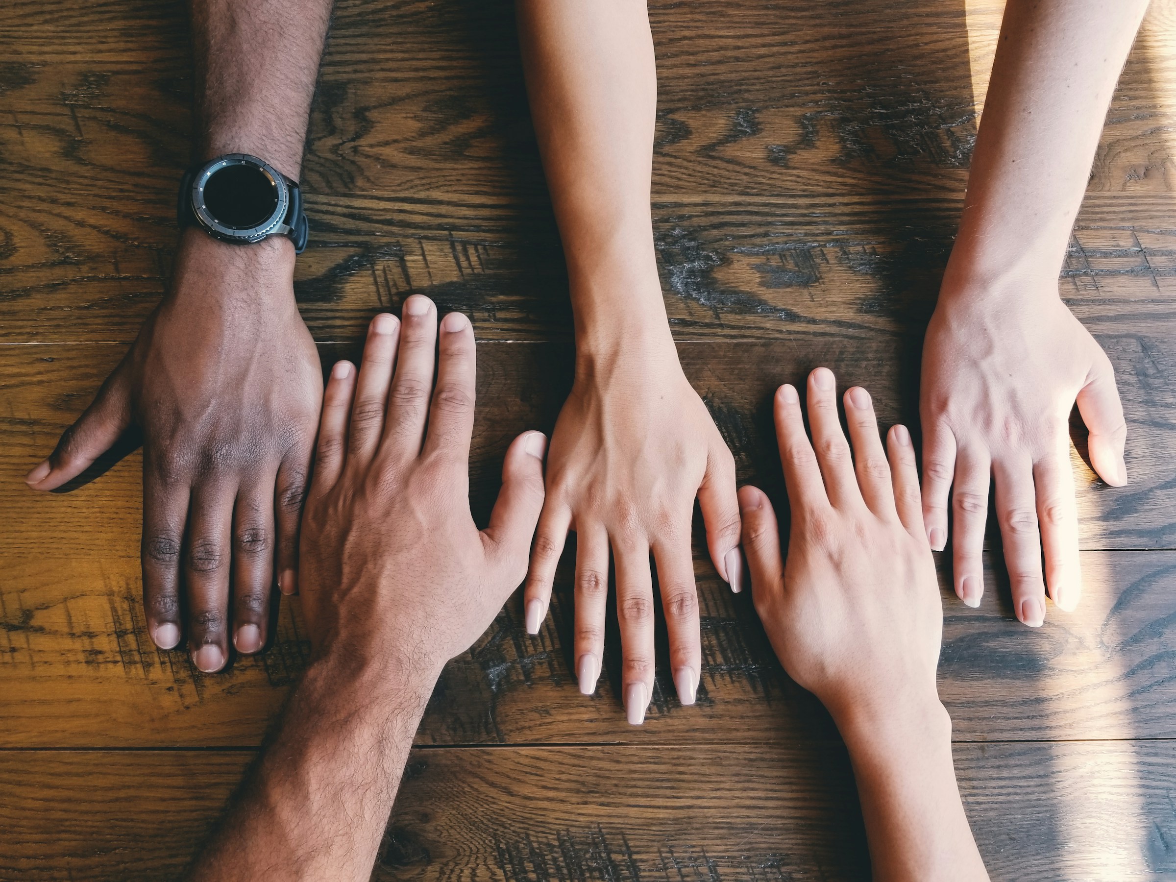 Community hands together
